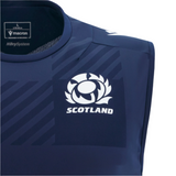 Close-up of the Scotland 25/26 Player Training Singlet by Macron in navy blue, showing the Scottish Rugby logo, "SCOTLAND" text, and Macron brand logo on the upper chest.