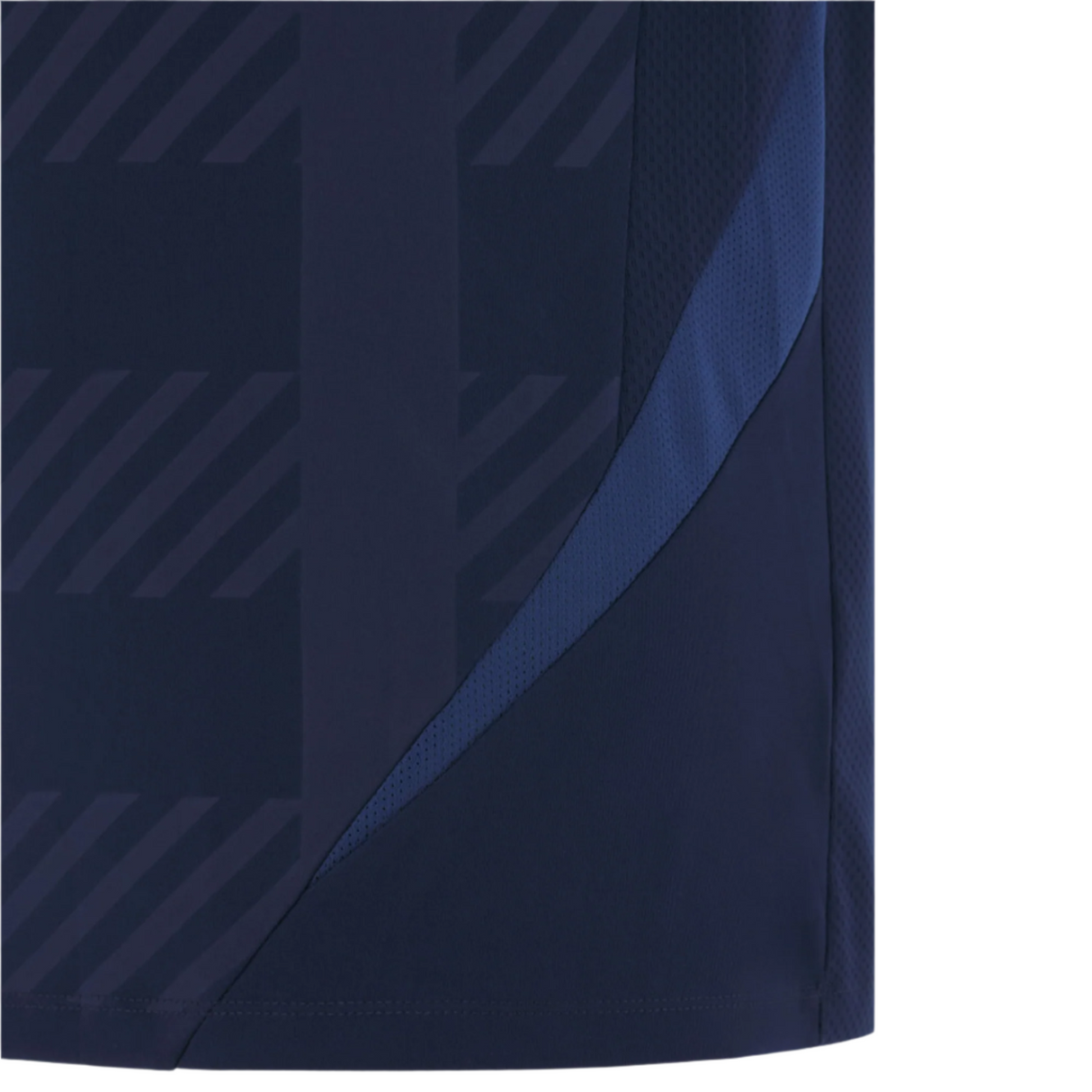 Close-up of the Scotland 25/26 Player Training T-Shirt by Macron, in navy and dark blue with diagonal stripes, a curved seam, and moisture-wicking fabric.