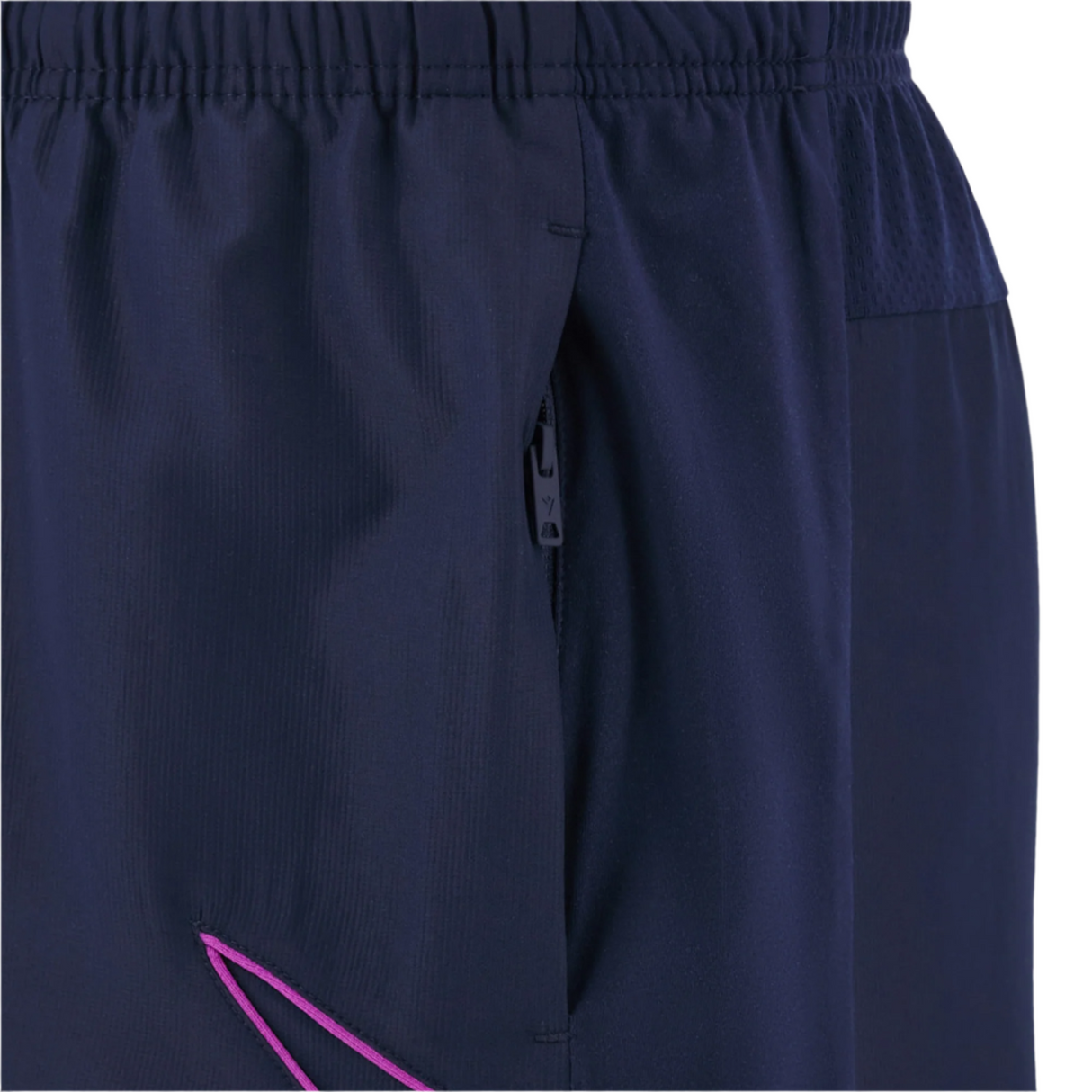 Close-up of Scotland 25/26 Player Training Short by Macron in navy, featuring an elastic waistband, side zippered pocket, and small pink stitched accent on the lower leg—ideal for athletic performance.