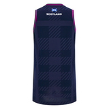 The Scotland 25/26 Basketball Singlet by Macron features a navy blue tartan design, "SCOTLAND" text, small Scottish flag on the upper back, and is made from breathable performance fabric.