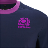 Show your support with the Scotland 25/26 Player Travel T-Shirt by Macron, featuring a navy blue design, purple collar, stylized thistle logo in purple and pink, and "SCOTLAND" on the chest—the ideal rugby shirt for fans.