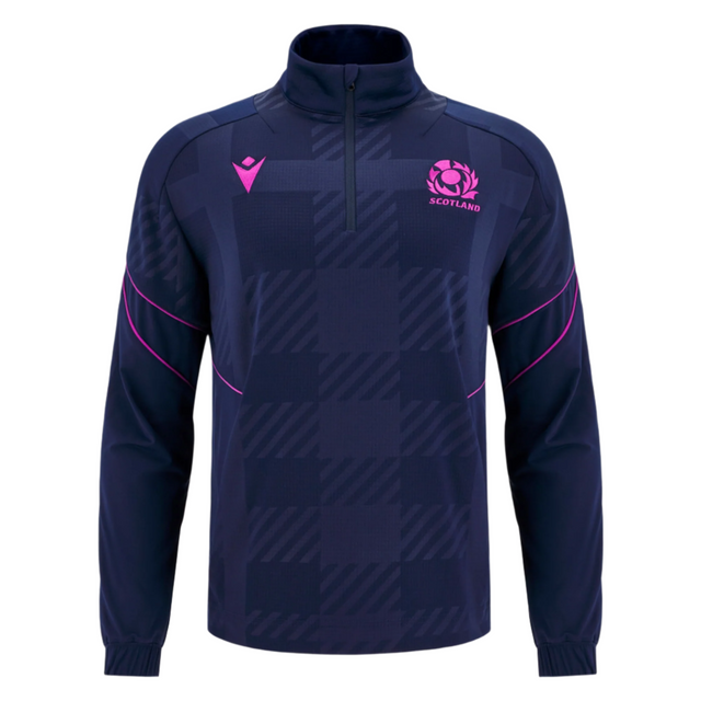 The Scotland SRU 25/26 Player Travel 3D Fleece by Macron is a navy long-sleeve top with soft 3D fleece, a quarter zip, pink accents, and the Scotland SRU rugby logo on the chest.