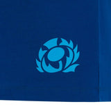 The Scotland 25/26 Murrayfield Stadium T-Shirt by Macron features a stylized light blue thistle logo near the bottom hem, inspired by Murrayfield Stadium.