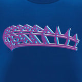 A bold geometric purple and blue crown graphic on a blue background adorns the Scotland 25/26 Murrayfield Stadium T-Shirt by Macron, capturing the stadium's spirit in stylish detail.