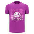 The Scotland 25/26 Leisure T-Shirt by Macron is a purple tee featuring "Scotland" repeated in white and pink text, plus a central thistle rugby emblem.