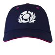 The Scotland 25/26 Baseball Cap by Macron is a navy blue cap with a white embroidered spiral on the front, pink accents on the rim and eyelets, blending modern style with Scottish Rugby heritage.