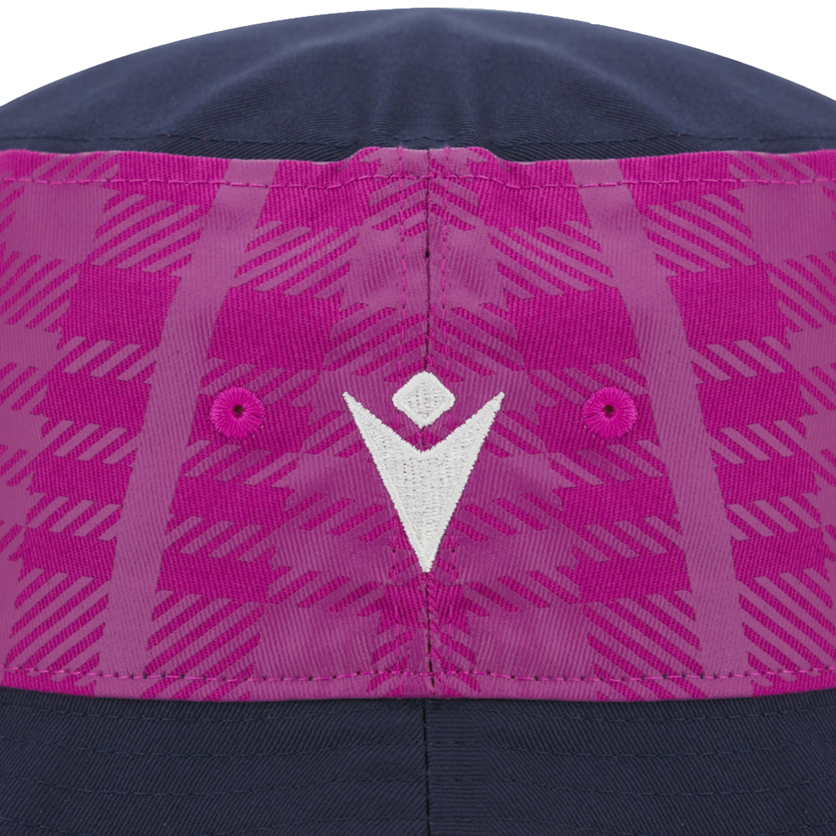 Close-up of the back of the Scotland 25/26 Bucket Hat by Macron in navy blue with pink and magenta patterned fabric, featuring a white geometric logo embroidered at the center.