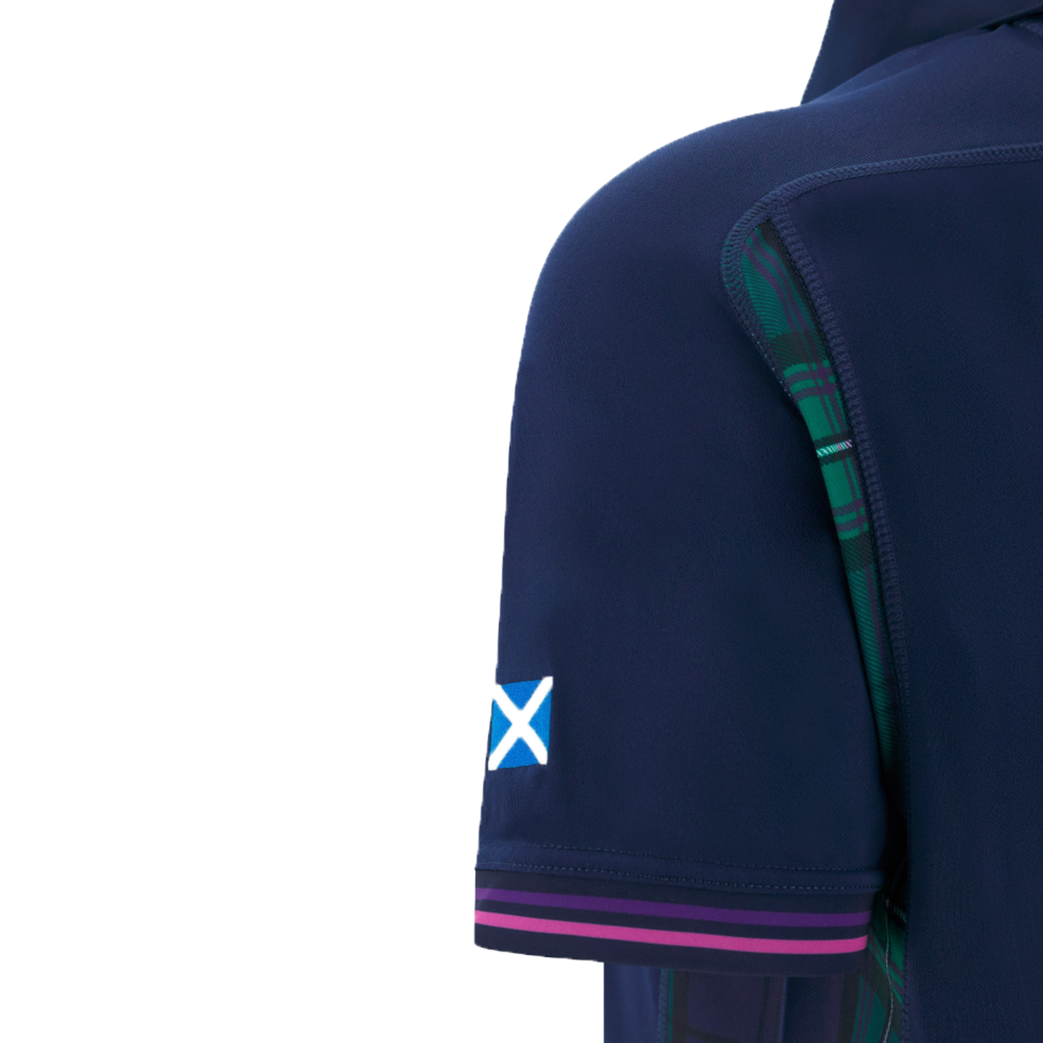 A close-up of the upper arm of the Scotland WRWC25 Replica Home Jersey by Macron shows a small Scottish flag patch and green tartan detail on the side.