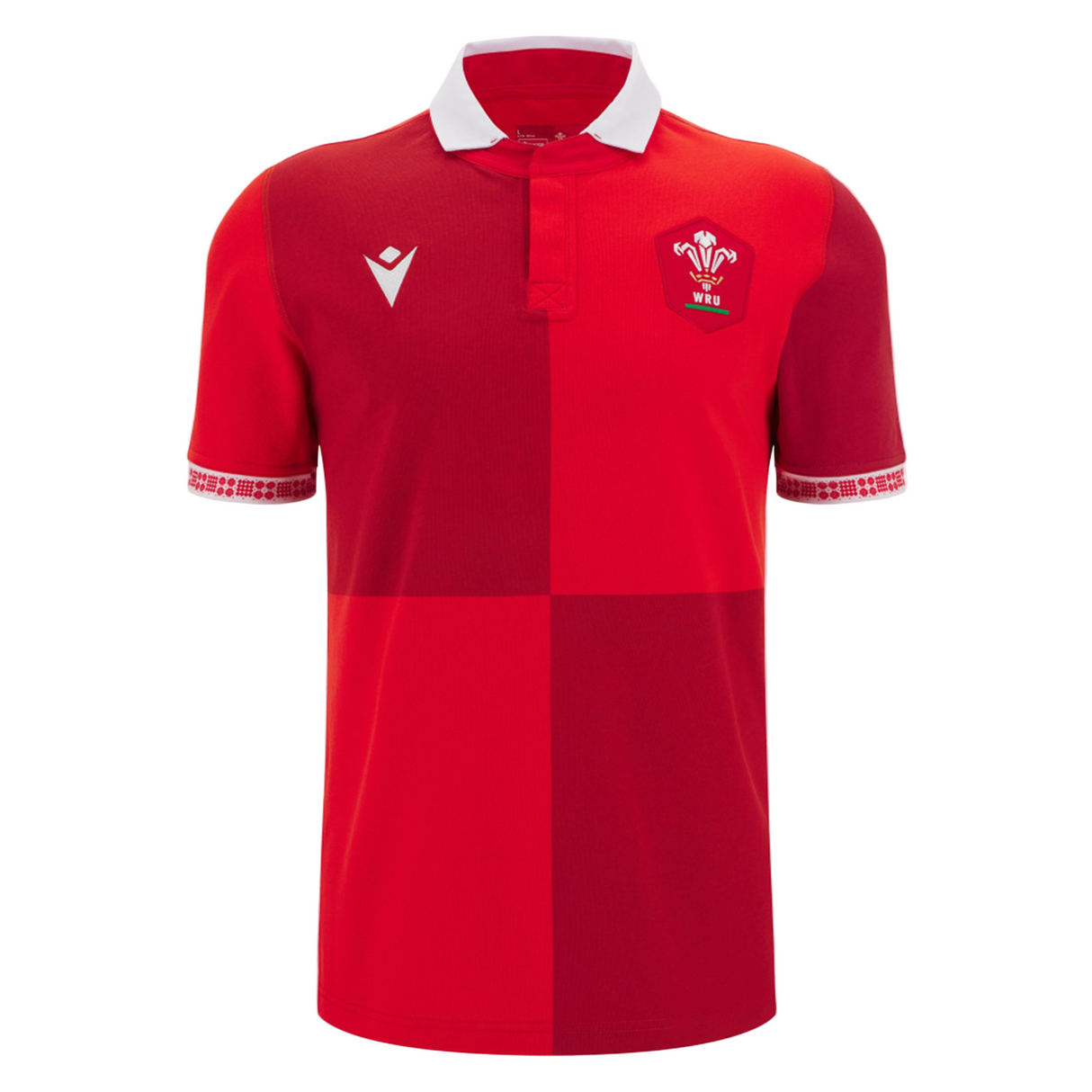 The Wales 25/26 Replica Home Cotton Jersey by Macron features red and dark red quarters, a white collar, the Welsh Rugby Union logo on the left chest, and the Macron logo on the right—a classic fan jersey.