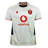 The Wales 25/26 Replica Away Jersey by Macron is a white rugby jersey with subtle topographic patterns, red trim, Vodafone sponsor logo, and the WRU emblem on the chest.