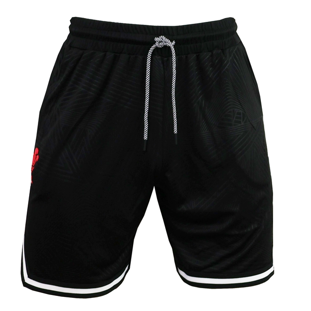 The Wales 25/26 Basketball Shorts by Macron feature a black athletic fit, white drawstring, subtle leaf pattern, white leg trim, and a small red logo on the left thigh. Inspired by classic WRU basketball shorts.