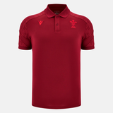 The Wales 25/26 Player Travel Poly Polo by Macron is a maroon, short-sleeved collared shirt with a button placket and two embroidered chest logos—perfect for rugby fans wanting classic Macron style.