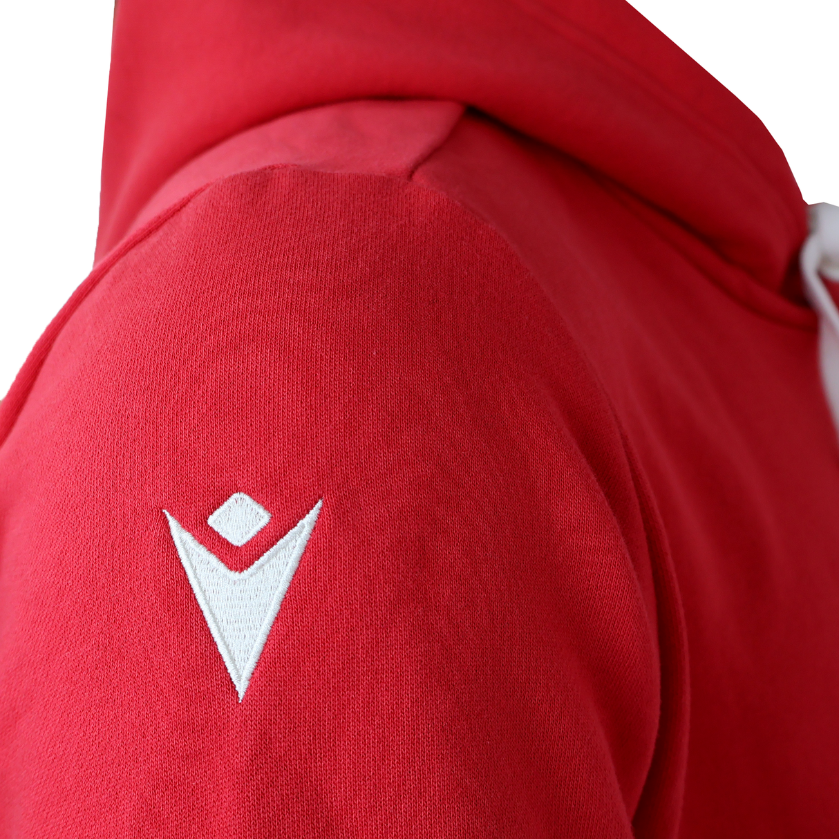 Close-up of the Wales 25/26 Welsh Rugby Cotton Fan Hoodie by Macron in red, featuring a white embroidered logo on the shoulder.