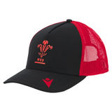 The Wales 25/26 Trucker Cap by Macron features a black and red mesh design with the WRU logo on the front and a small brim logo.