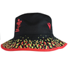 The Wales 25/26 Bucket Hat by Macron features a black base, red trim, red WRU logo, and a yellow and green geometric pattern around the brim.