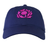 The Scotland 25/26 Dad Cap by Macron is navy blue and features a bright pink embroidered circular thistle floral logo on the front.