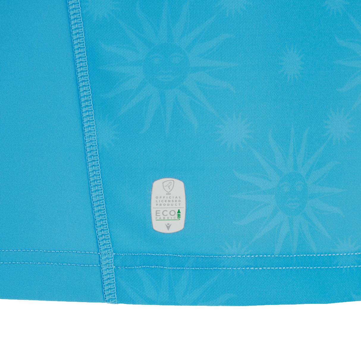 Close-up of the Uruguay URU 25/26 Replica Home Jersey by Macron, featuring blue fabric with sun motifs, detailed stitching, and a small “Official Product ECO” label—showcasing meticulous Macron craftsmanship.