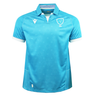 The Uruguay URU 25/26 Replica Home Jersey by Macron features light blue short sleeves, white trim, a stylized bird crest with “URU” text on the chest, and subtle sunburst patterns, all made from EcoFightex fabric.