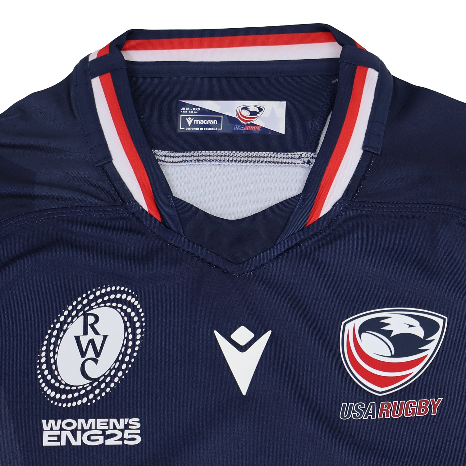 The Youth USA Rugby 24/25 Home WRWC Jersey by Macron features USA Rugby and Women's RWC England 2025 logos, red/white/blue collar detailing, and an official Macron design for comfort and style.
