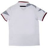 Youth USA Rugby WRWC 25 Home Jersey by Macron, white with gray geometric shoulder accents and red, black, and white trim on collar and cuffs—ideal for WRWC 25 fans. Seen from the back.