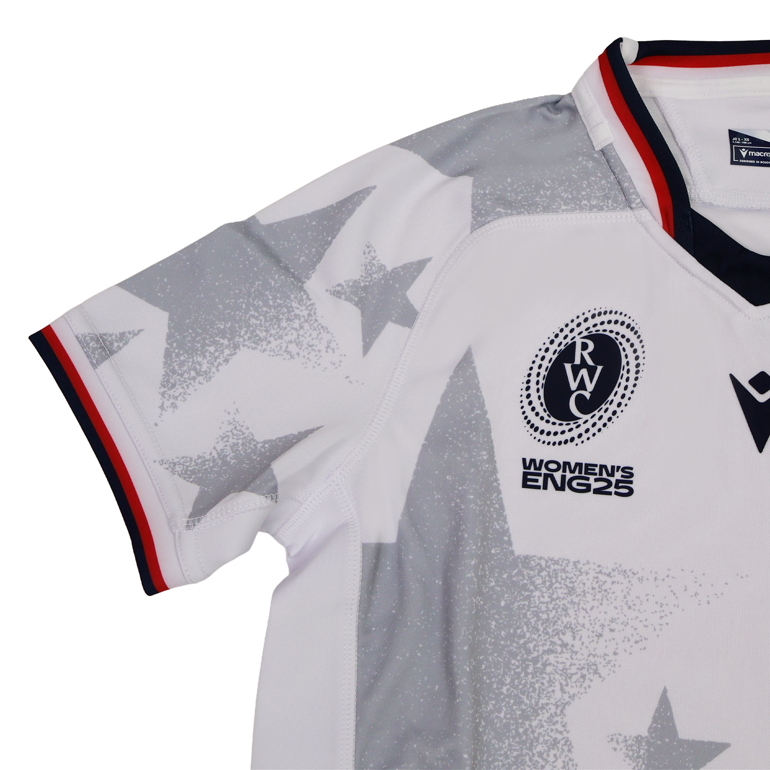 The Youth USA Rugby WRWC 25 Home Jersey by Macron features white fabric, gray star patterns, a red, white, and blue collar, and chest emblems reading “RWC,” “Women’s ENG25,” and “WRWC 25.”.
