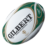 A close-up of a Gilbert rugby ball with green and gold designs, labeled as the official Springboks Rugby World Cup 2023 Champions Ball.