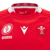 Close-up of the Women's Wales WRWC25 Replica Home Jersey by Macron, showcasing the WRU logo and RWC Women's ENG25 emblem on the chest.