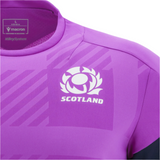 Close-up of the Scotland 25/26 Player Training T-Shirt by Macron—this purple, moisture-wicking sports tee features the team's thistle logo and Macron branding on the chest.