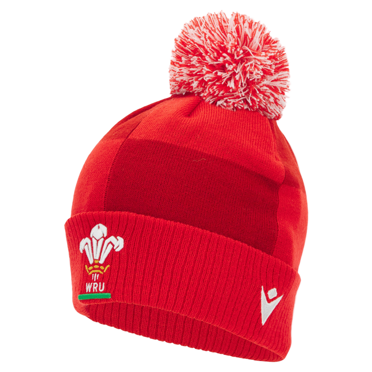The Wales 25/26 Pom-Pom Beanie by Macron is a red knit winter hat with a white and red pom-pom, featuring the WRU logo and a white Macron logo on the front.