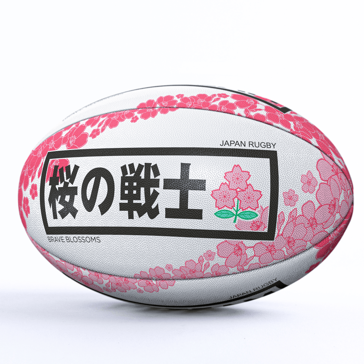 A Japan Supporters Ball by Gilbert with pink cherry blossom designs, featuring Japanese text and the inscriptions "JAPAN RUGBY" and "BRAVE BLOSSOMS," perfect for Japan supporters.