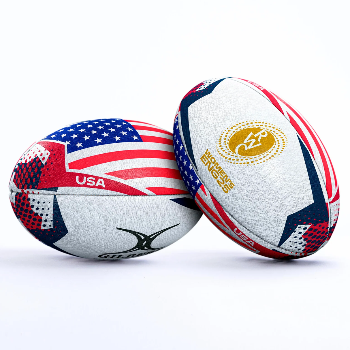 Two Gilbert rugby balls, including the Women's Rugby World Cup 25 USA Team Ball, featuring USA flag designs and branding, are displayed side by side on a white background.