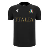 The Italy 25/26 Cotton Supporters Shirt by Macron is black, crafted from soft cotton, with "ITALIA" in gold, the Italian Rugby Federation crest on the left chest, and a Macron logo on the right.
