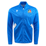 The Italy Full-Zip Softshell Anthem Jacket 22/23 by Macron is a blue zip-up sports jacket featuring a hexagonal pattern design and an embroidered crest on the left chest, which includes a shield, Italian flag colors, and the acronym "FIR." This Italy Rugby Anthem Jacket is perfect for fans.