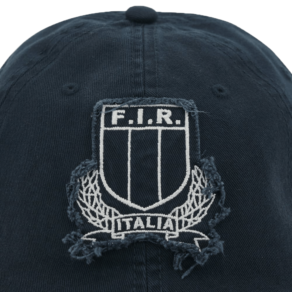 A navy baseball cap with the Italy FIR Cap 23/24 by Macron logo on it.