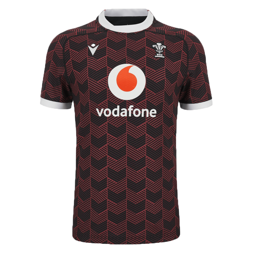 The Macron Wales Rugby Union 23/24 Training Jersey is red and black with the Macron logo on it.