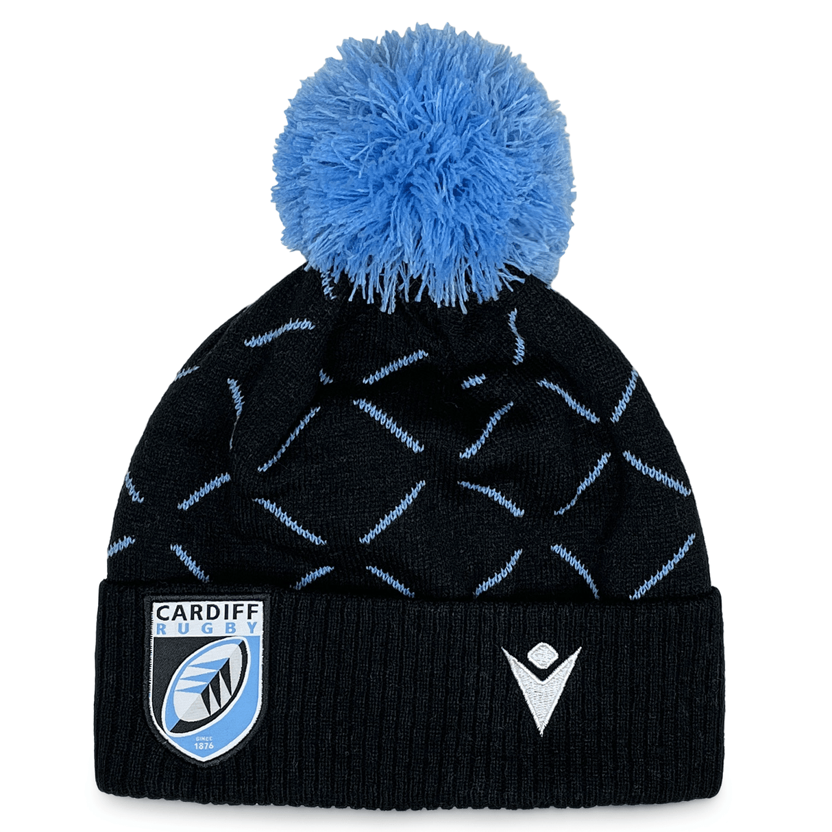 Black and blue Cardiff Blues Pom Pom Beanie 23/24 by Macron with a Cardiff Rugby logo patch and a blue pom-pom on top.