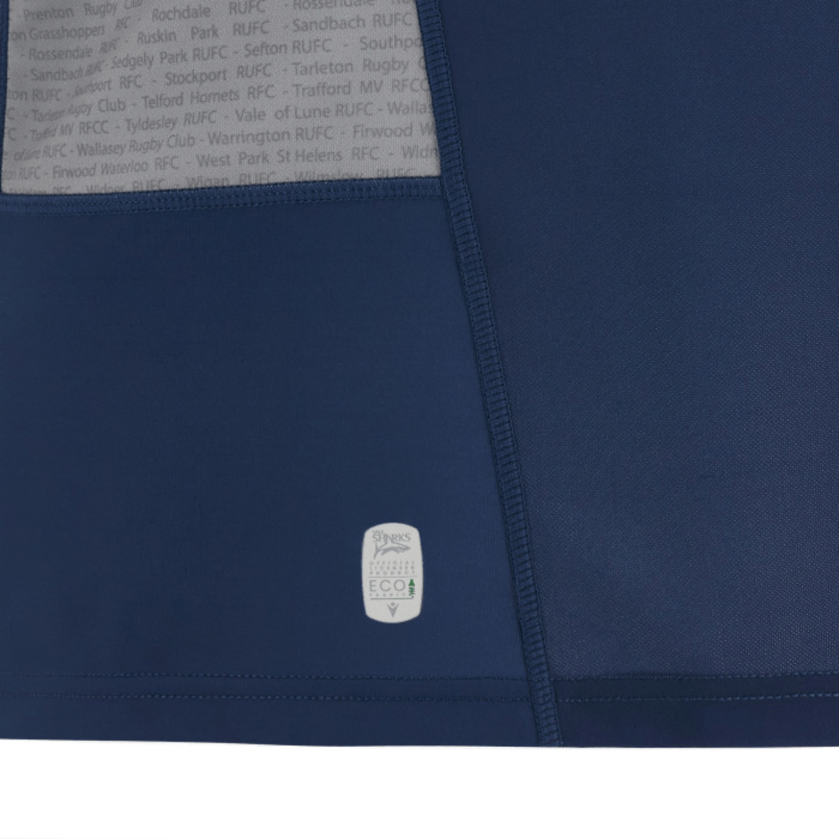 The official Sale Sharks Home Jersey 23/24 by Macron, featuring a blue hoodie with a white logo on it.