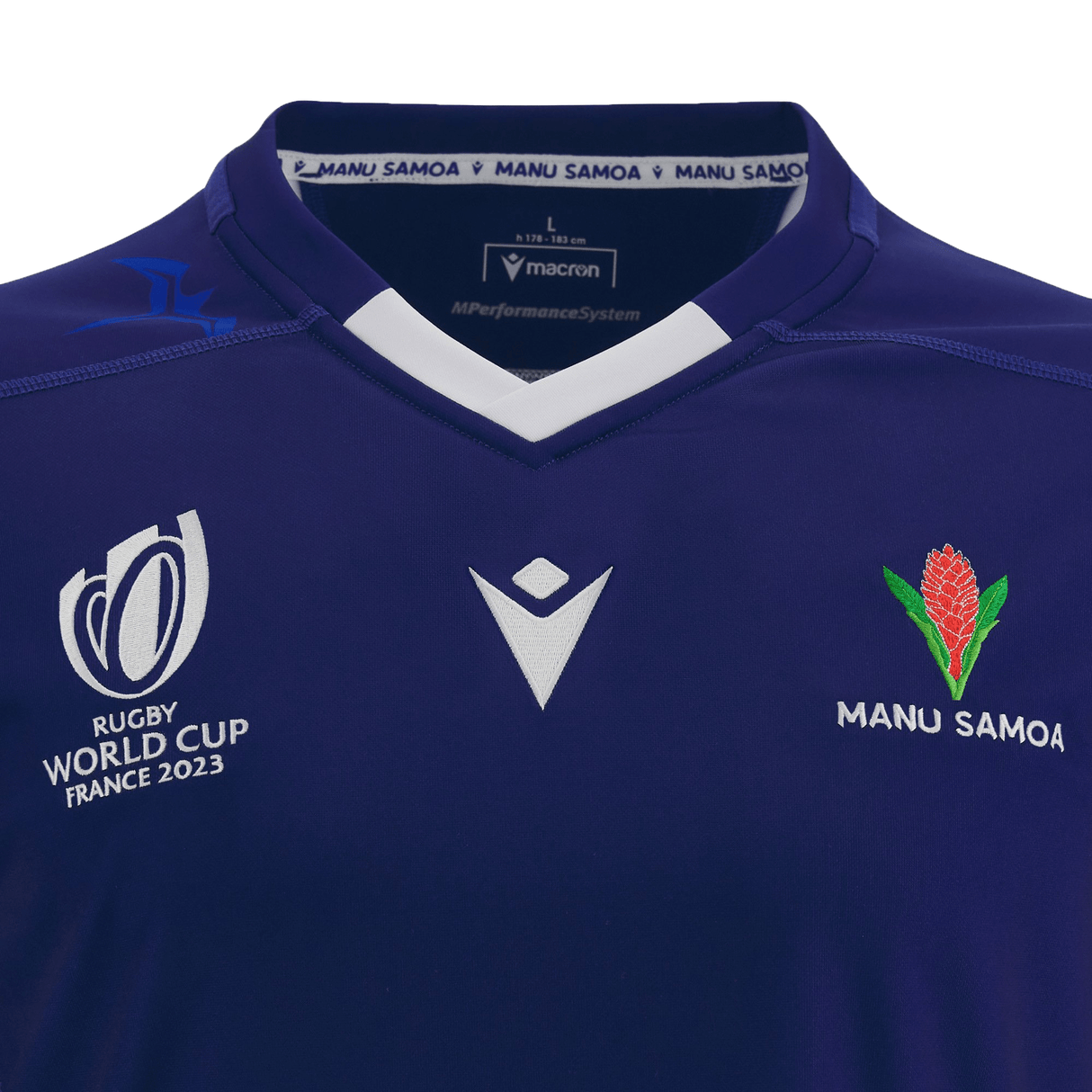 A Macron Samoa RWC23 Home Jersey by Macron for the Rugby World Cup 2023, featuring a blue design with a red and white logo.
