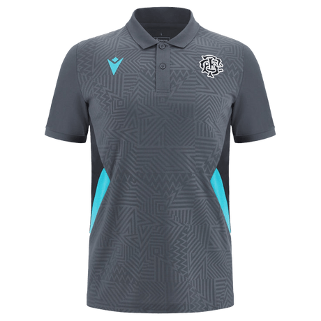The Barbarians Poly Polo 23/24 by Macron is a gray short-sleeved shirt featuring geometric patterns and teal accents on the sides, with two logos on the front. This lightweight polo is crafted from high-tech fabric by Macron, providing ultimate comfort and performance.