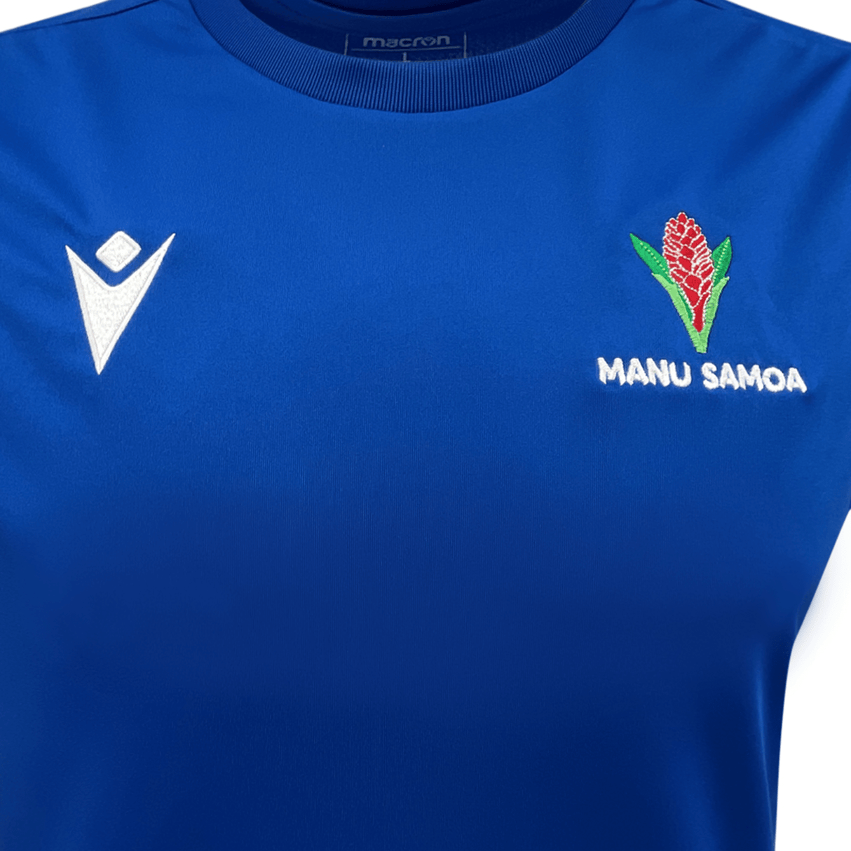 An official Macron Samoa Training Singlet for women featuring a blue jersey with a flower.