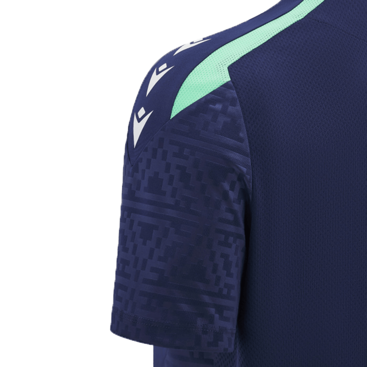 Close-up view of the shoulder and upper sleeve of a dark blue Scotland Training Shirt 24/25 by Macron, featuring light green accents, breathable mesh inserts, and white logo details.