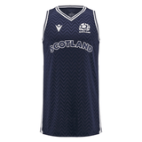 The Scotland Basketball Singlet 24/25 by Macron showcases a navy blue design adorned with a prominent white zigzag pattern and accented with white trims. The word "Scotland" is prominently featured on the chest next to a thistle logo, seamlessly blending style with national pride.