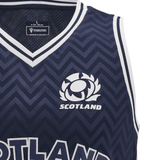 Close-up of a navy blue Scotland Basketball Singlet 24/25 by Macron, showcasing white zigzag patterns and adorned with the Scotland rugby logo above the word "SCOTLAND." Designed for the 24/25 season, this piece captures the vibrant energy of a Scotland basketball singlet.