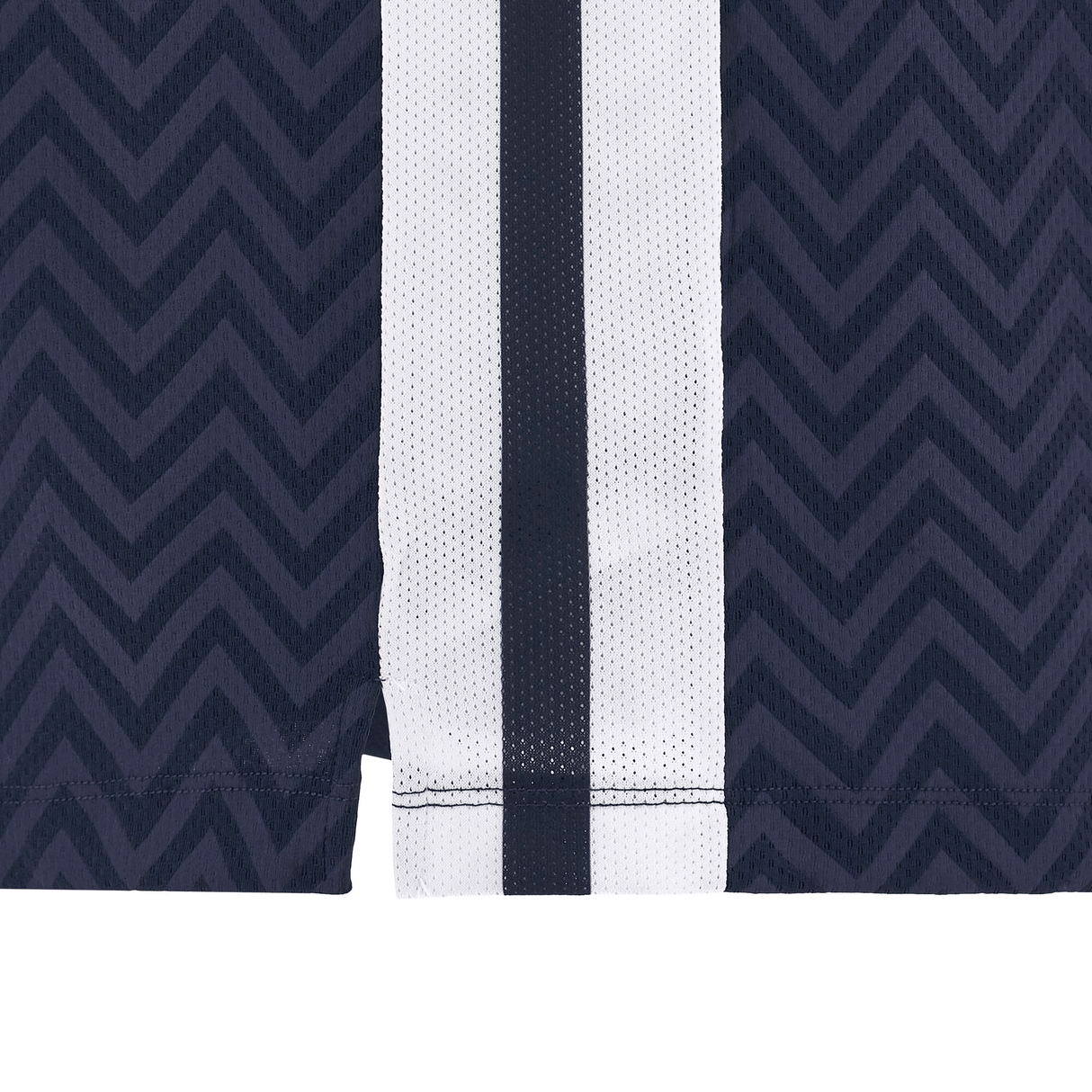 A detailed view of the navy blue and white chevron-patterned fabric on the Scotland Basketball Singlet 24/25 by Macron shows a vertical white stripe accented with black lines.