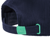Close-up of the back of the Scotland Dad Cap 24/25 by Macron in dark blue corduroy, showcasing an adjustable strap with a green buckle featuring a crab design.