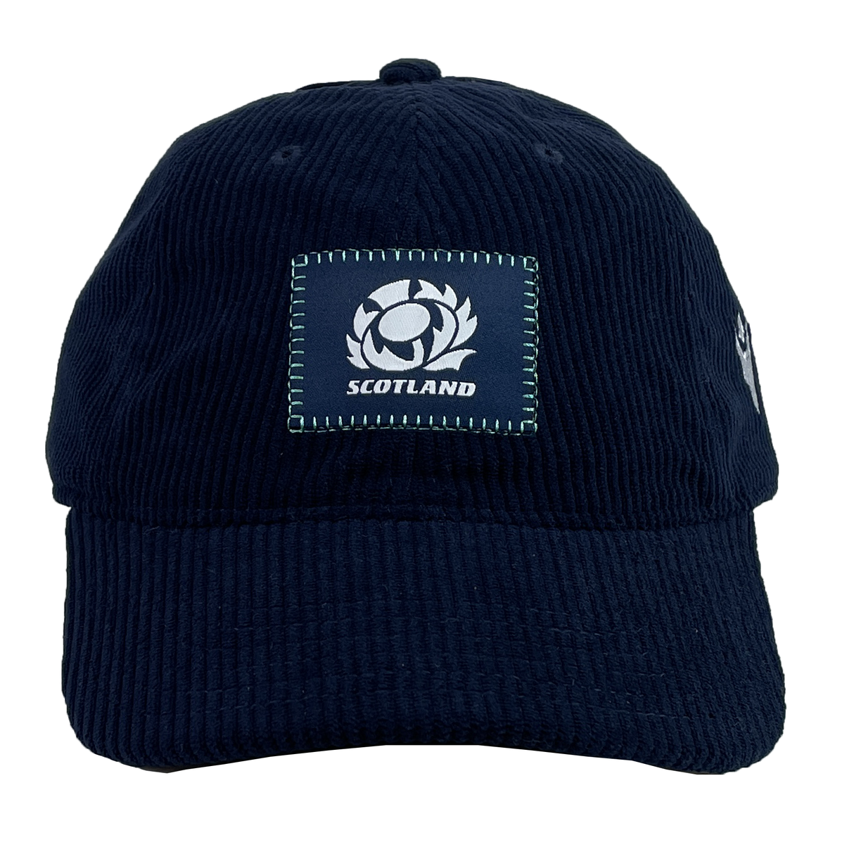 The Scotland Dad Cap 24/25 by Macron is a navy blue cap featuring a prominent crest patch on the front.