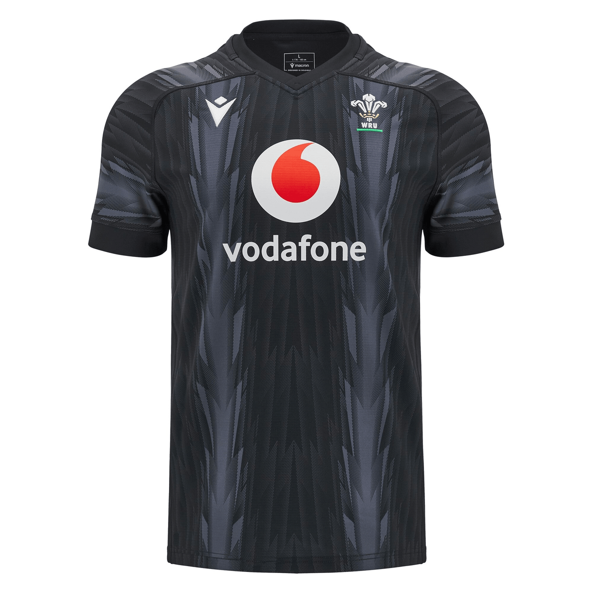 The Wales 24/25 Training Jersey by Macron, in black, features a subtle design alongside the Vodafone logo and the Wales Rugby emblem, capturing the essence of a true Wales Training Jersey.