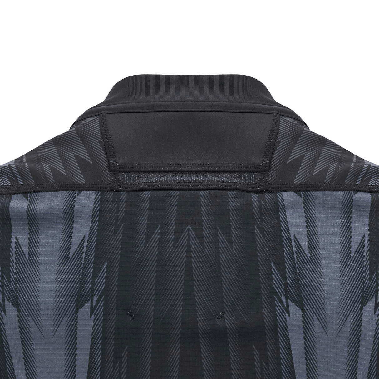 Close-up of the back of a black and gray patterned jacket with a standing collar, reminiscent of the sleek design of the Wales 24/25 Training Jersey by Macron.
