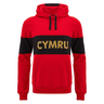 Wales 24/25 CYMRU Leisure Hoodie by Macron featuring a red design with black accents and "CYMRU" boldly printed in gold text on the front.