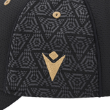 Close-up of the Wales 24/25 Baseball Cap by Macron featuring a geometric pattern and a gold embroidered symbol on the side.